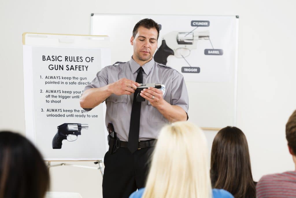 can security guard carry firearms